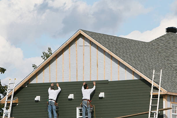 Professional Vinyl Siding technician working in Parker, FL
